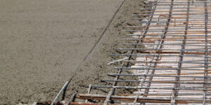 pouring concrete into prepared place with reinforced metal frame The prices of concrete reinforcing steel mesh